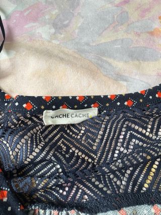 Blusa negra y naranja