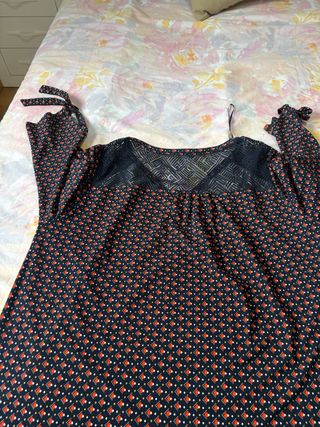 Blusa negra y naranja