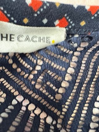 Blusa negra y naranja