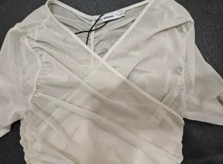 Top tul manga larga beige talla única