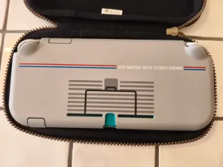 Nintendo Switch Lite + custodia + cover