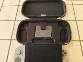 Nintendo Switch Lite + custodia + cover