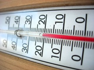 Termometro da parete in legno