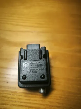 Adaptador Nintendo 64 en perfecto estado