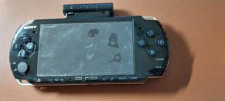 PSP Negra con Batería, cargador y 4 juegos