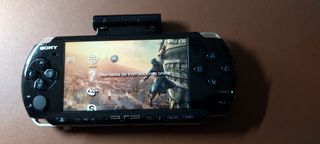 PSP Negra con Batería, cargador y 4 juegos