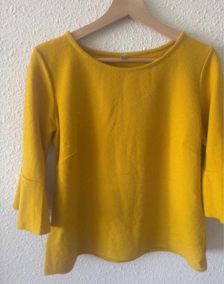 Blusa amarilla manga acampanada