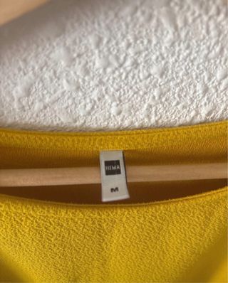 Blusa amarilla manga acampanada