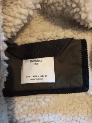 Abrigo verde forrado con capucha