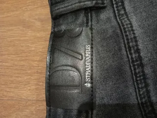 Pantalón Stradivarius gris campana mujer