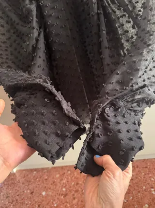 Blusa negra transparente mangas abullonadas