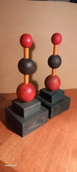 Sculture in legno fermalibri