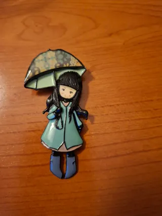 Broche niña con paraguas