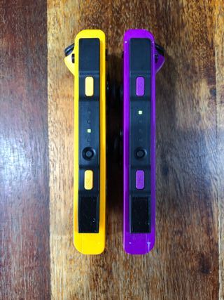 Nintendo Switch Set 2 Joy-Con viola/arancioni Neon