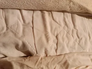 Protectores de colchón para mini cuna