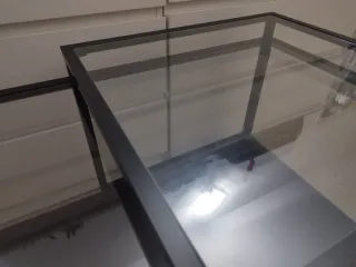 Mesita nido cristal y metal negra