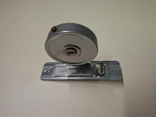 Rullino guidacinghia con molla