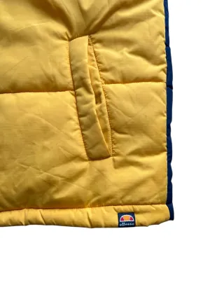 Chaleco ellesse azul y amarillo