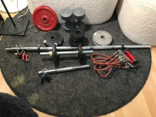 Barra, mancuernas y 20 discos de peso