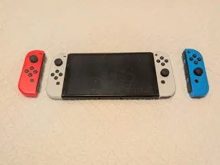 Nintendo Switch OLED + 2 controller + 3 giochi + 4 joy-con +