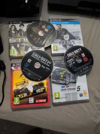 Consola PlayStation 3 con 4 mandos y juegos