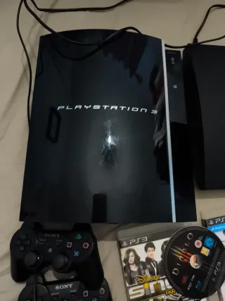 Consola PlayStation 3 con 4 mandos y juegos
