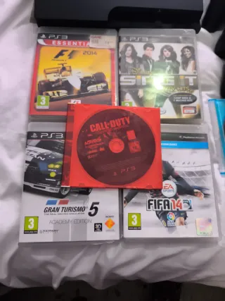 Consola PlayStation 3 con 4 mandos y juegos