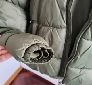 Plumífero niño verde marca Sfera