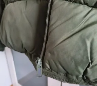 Plumífero niño verde marca Sfera