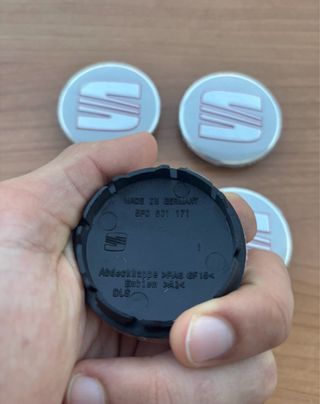 Tapabujes Seat 56mm Plata (4 uds)