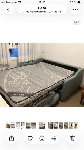 Sofá cama gris de tela