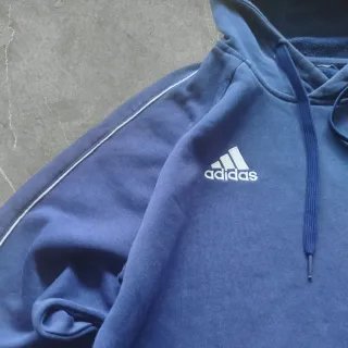 Sudadera Adidas azul con líneas blancas