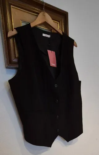 Conjunto chaleco y pantalón negro 44/48 por 17 eur