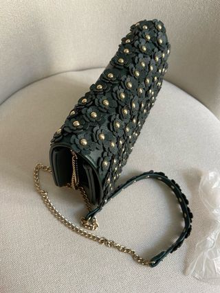 Bolso Michael Kors verde con flores doradas