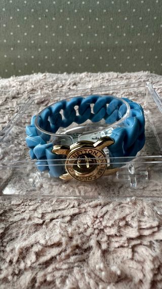 Pulsera Benetton azul y dorada