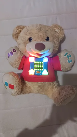 Oso musical Fisher Price con pilas