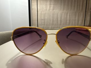 Gafas de sol Carolina Herrera doradas y moradas