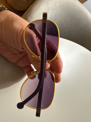 Gafas de sol Carolina Herrera doradas y moradas