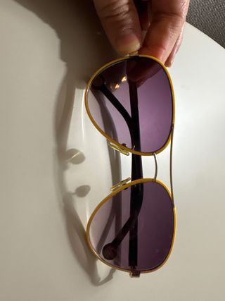 Gafas de sol Carolina Herrera doradas y moradas