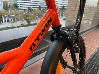 Bicicleta Decathlon 16 pulgadas niño naranja