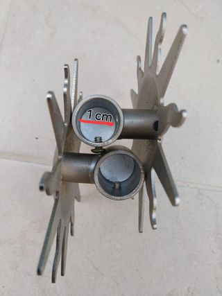 Topes metálicos estrella para barra cortina