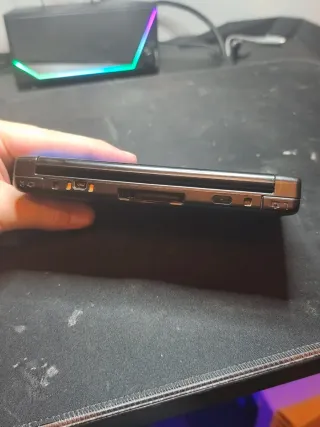 Nintendo 3DS XL azul con cargador y lápiz