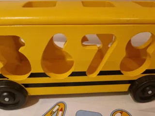 Juguete educativo bús con números de madera.
