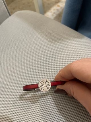 Pulsera infantil con dos figuras
