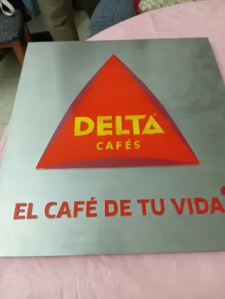 Cartel Delta Cafés Iluminación