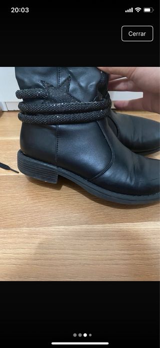 Botas altas negras con detalle brillante