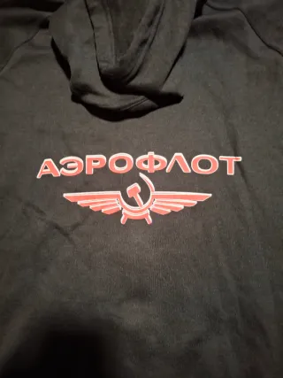 Sudadera con cremallera y logo