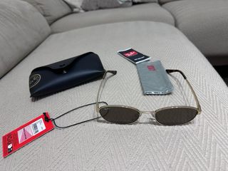 Gafas de sol Ray-Ban doradas y marrones