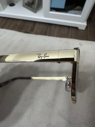 Gafas de sol Ray-Ban doradas y marrones