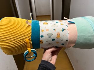 Cojín de actividades sensoriales para bebés